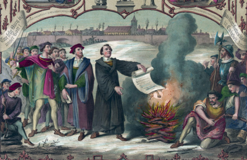 Martin Luther burning the papal bull that excommunicated him from the Roman Catholic Church in 1520, with other scenes from Luther's life and portraits of other Reformation figures, lithograph by H. Breul, c. 1874. Library of Congress, Washington, D.C. (digital file no. 00297u)