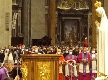 Pope Francis standing in front of the statue of Our Lady of Fatima in St. Peter's Basilica